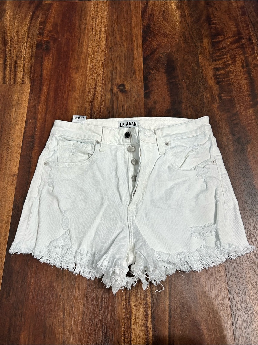 Le Jean Women's White Distressed Button-Fly Jean Shorts